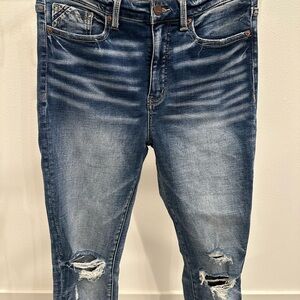 Buckle Black Distressed Blue Jeans